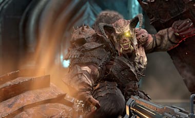 The Gladiator swings its weapon at the DOOM Slayer