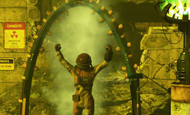 A Fallout 76 character stands under a Vault-Tec Decontamination Shower with arms raised. Nearby are radioactive warning signs, a Deathclaw radiation dummy, and a glowing green Weather Control Station (Radstorm). The scene has a greenish-yellow radioactive glow, set in a rundown industrial area.
