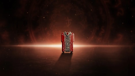 A metal red key card.