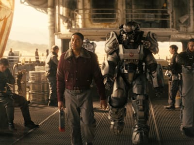 Fallout Season 2 still of Lucy and The Ghoul entering Vault 24