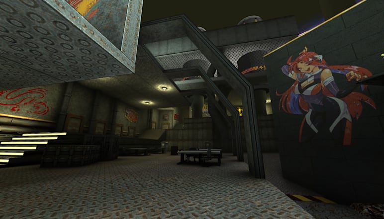 A metal lounge room with graffitied walls. 