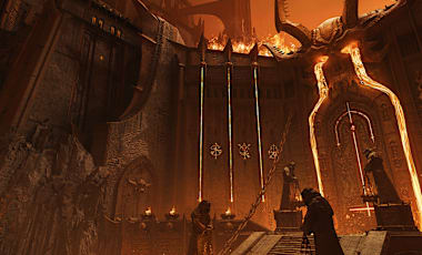 The gates of the Forsaken Plains look on, as lava flows from the eyes of an intimidating sculpture.