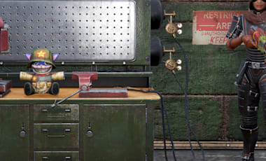 A character in Fallout 76 stands next to a Well-Kept Weapons Workbench, wearing the Black Ice Outfit Set and Black Ice Backpack, and holding a weapon with the Communist Carbine Paint. A Comrade Fuzzy Plushie is on the workbench. The background features green metal walls with some wear and tear.
