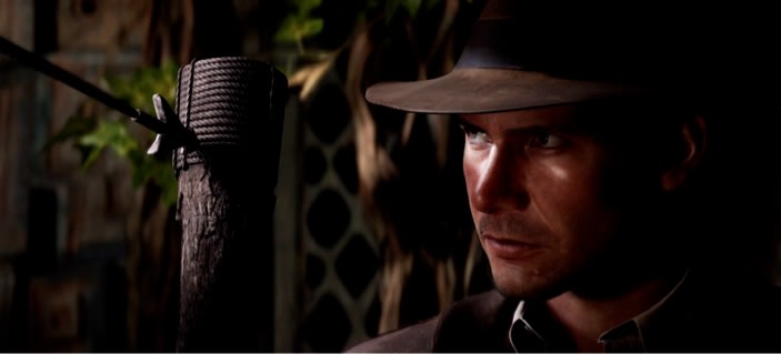 Indiana Jones looks at an arrow lodged into a wooden post