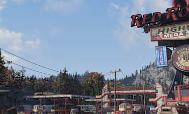 Image of a Red Rocket Station with the Rocket sitting on top of the building.