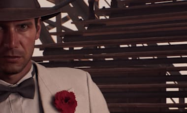 Indiana Jones faces the viewer dressed in his dapper white “Shanghai Club” outfit.