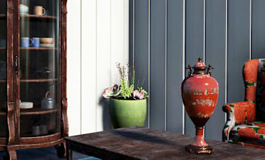 A old-fashioned dark wood cabinet with pristine glass doors around the shelves.