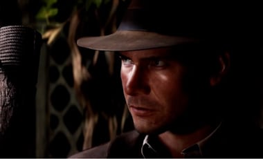 Indiana Jones looks at an arrow lodged into a wooden post