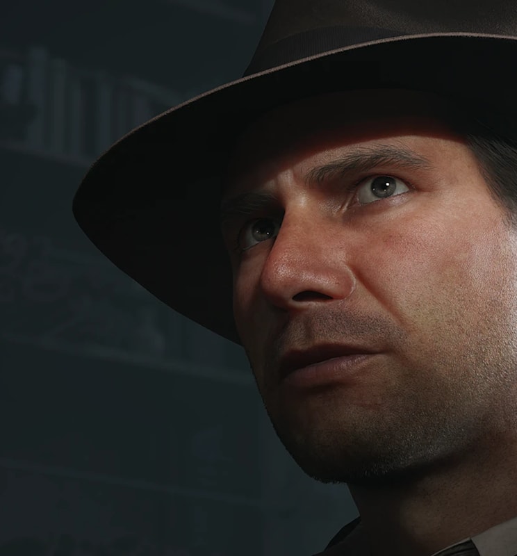 Close-up of Indiana Jones' face in a dark room