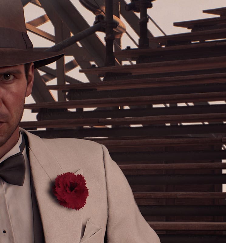 Indiana Jones faces the viewer dressed in his dapper white “Shanghai Club” outfit.