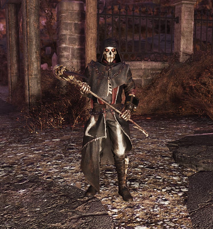 A character in Fallout 76 wearing a dark-colored Grim Reaper-inspired outfit, complete with a mask and hooded cloak.
