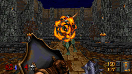 Hexen gameplay shows a player attacking a chaos serpent with a Mace of Contrition. An orange enemy attack is aimed at the player and stands out against the brown and grey background.