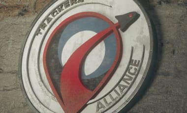 Trackers Alliance emblem on a brick wall