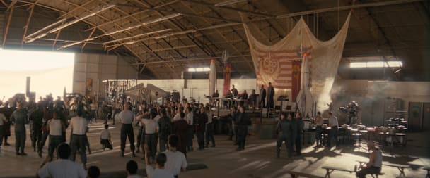 Fallout 76 screenshot of a desert Deathclaw standing next to a "Welcome to Ohio" sign