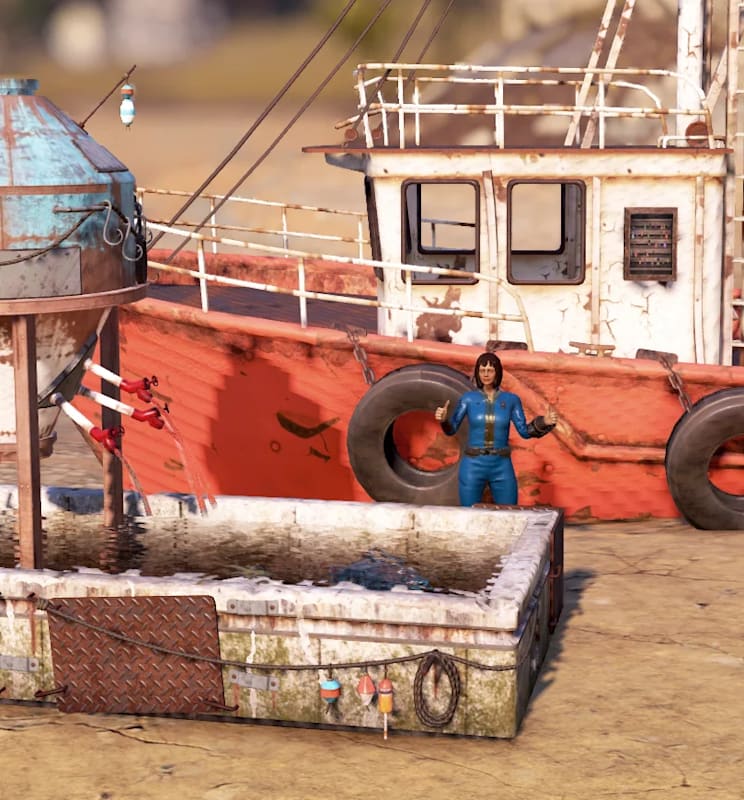 Character in blue jumpsuit stands by a red fishing boat and fish tank on a sandy shore.