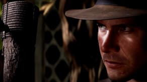 Indiana Jones looks at an arrow lodged into a wooden post