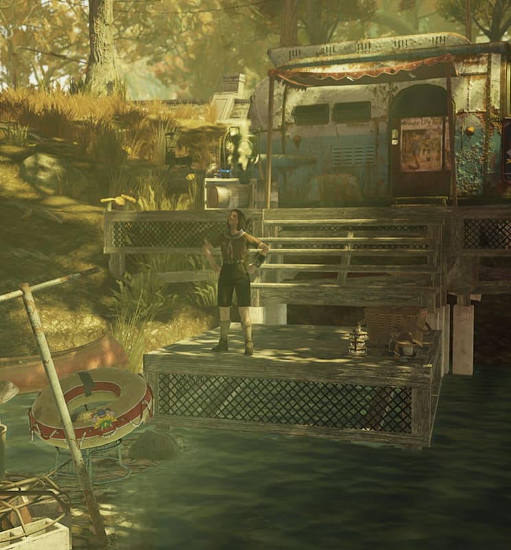A female character in a pioneer scout outfit with her hands on her hips. She's standing on a dock on water, and behind her is a rusted camper