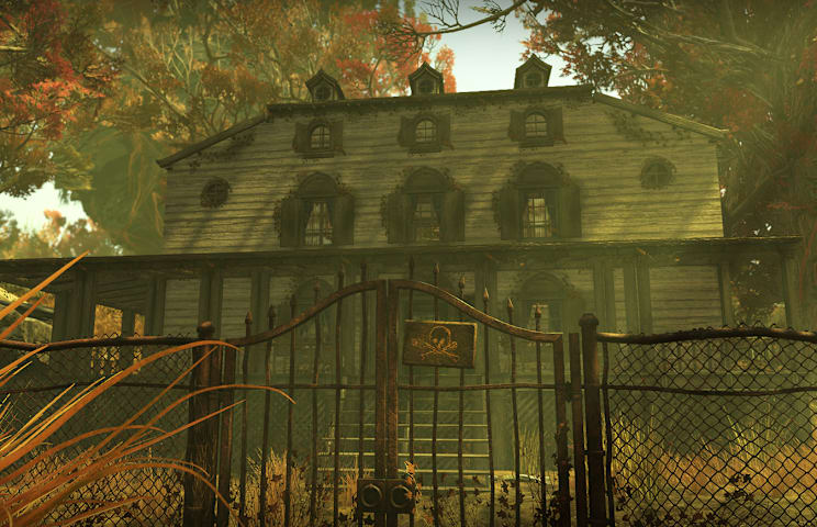 Weathered haunted C.A.M.P. house stands behind a rusted gate marked with a skull-and-crossbones, surrounded by autumn trees.