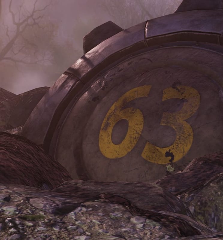 The door for Vault 63 is embedded into the ground after being blown off it's hinges.