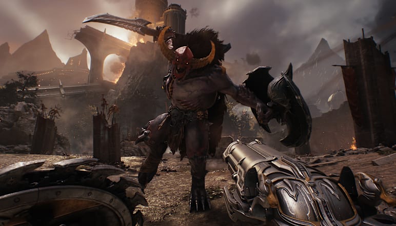 The Slayer fighting a demon with the Super Shotgun and Shield Saw, useful for judging close-range readability on Steam Deck
