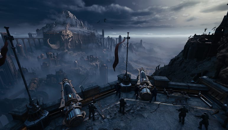 A cannon emplacement overlooks a war-torn village