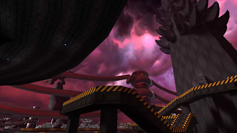 A dark pink cloudy sky looming overhead.
