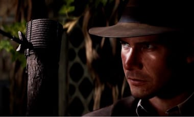 Indiana Jones looks at an arrow lodged into a wooden post