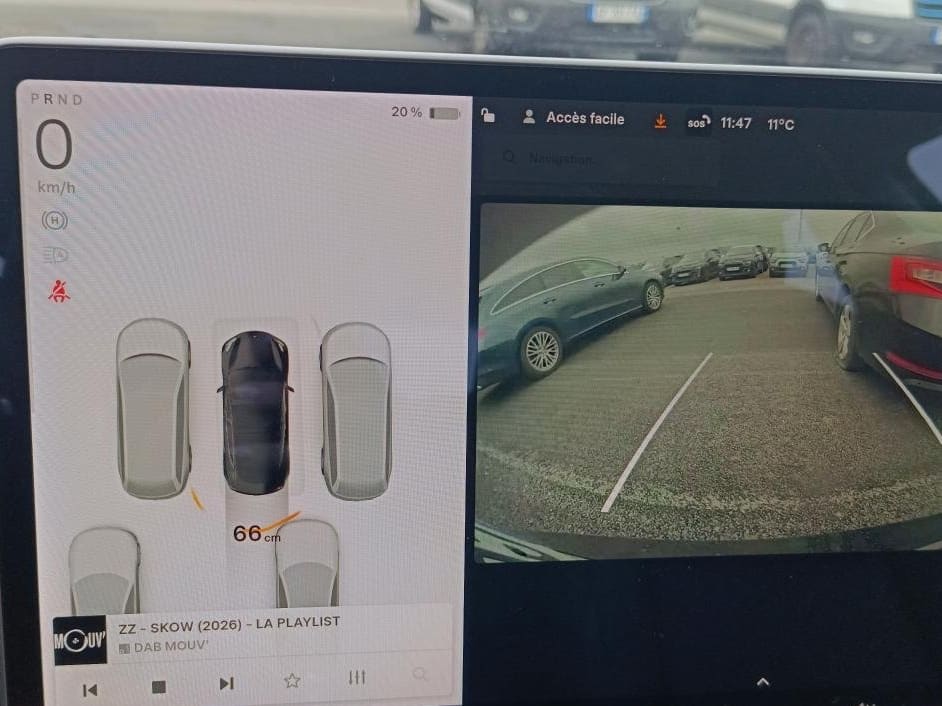 Tesla Model 3 — foto 12