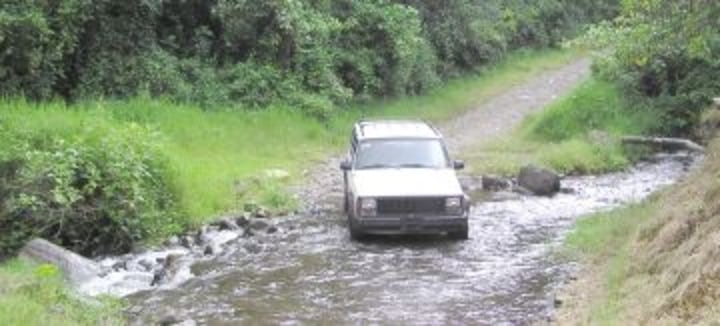 Car crossing river