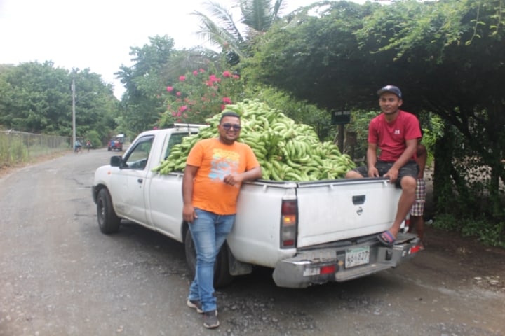 Men donating plantains