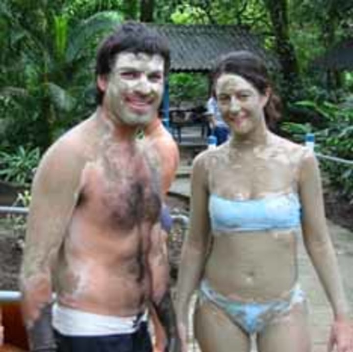 Tourist in a mud bath