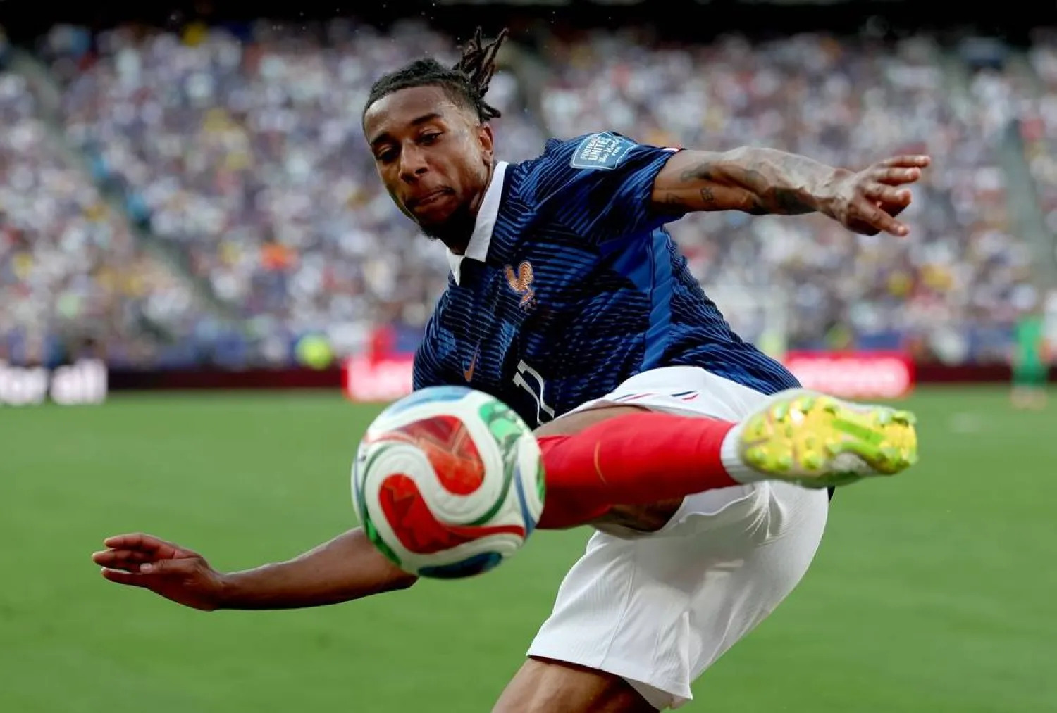 Olise's Suspension Hangs in Balance as FIFA Upholds Yellow Card Decision