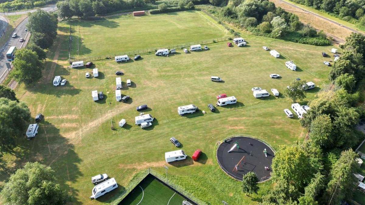 Football Club Struggles with Travelers' Occupation of Pitch and Park