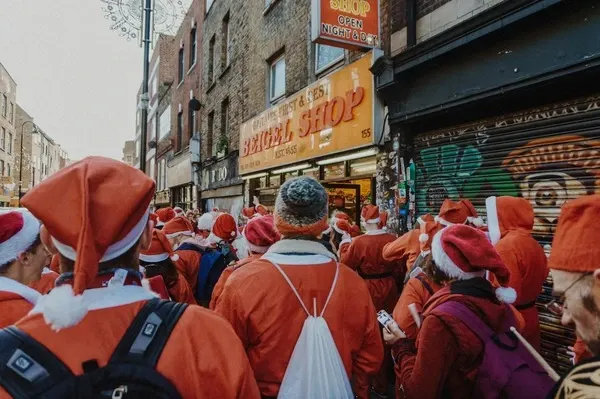 Group of people dressed like Santa