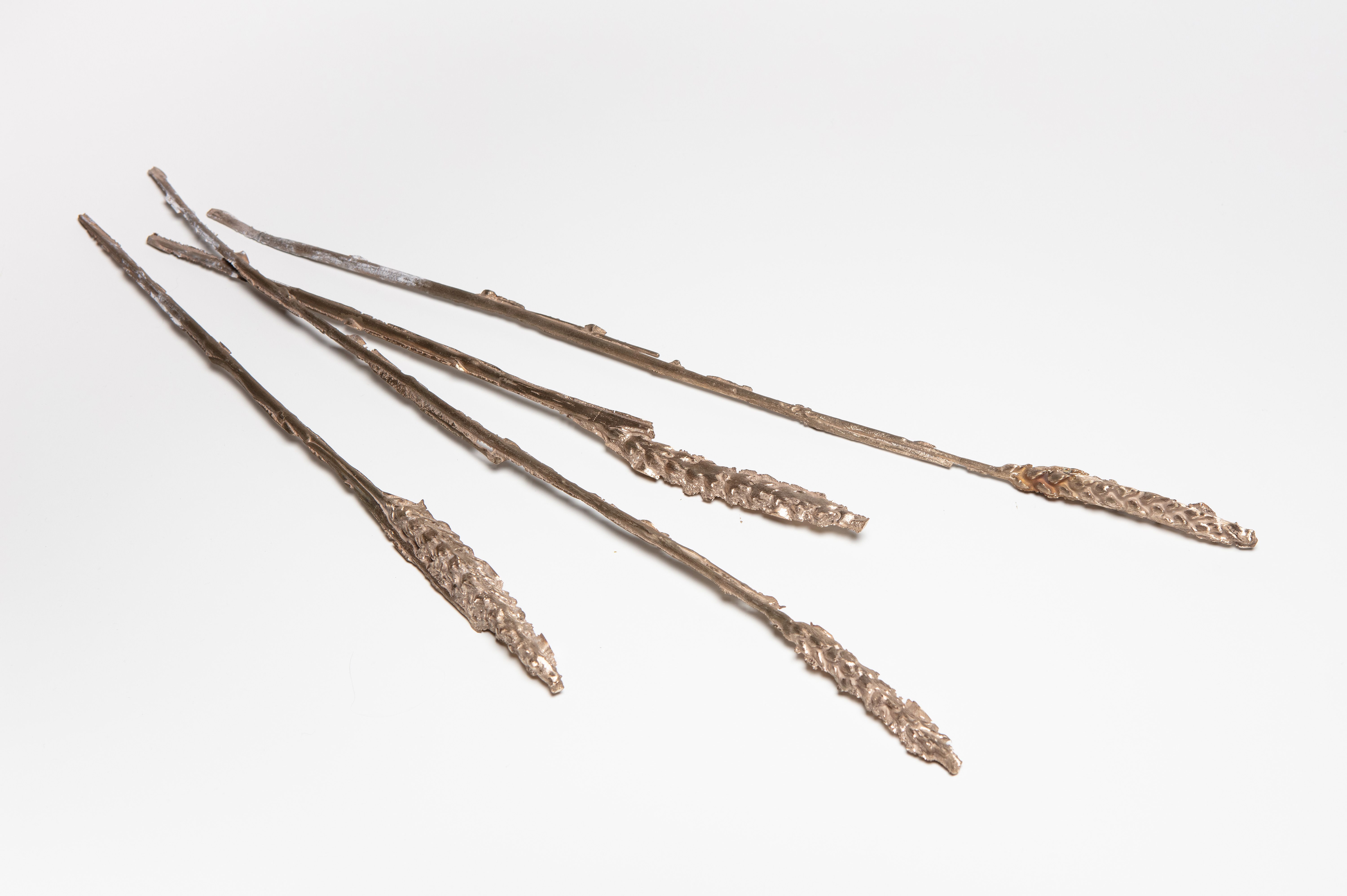 bronze casts of wheat stalks 