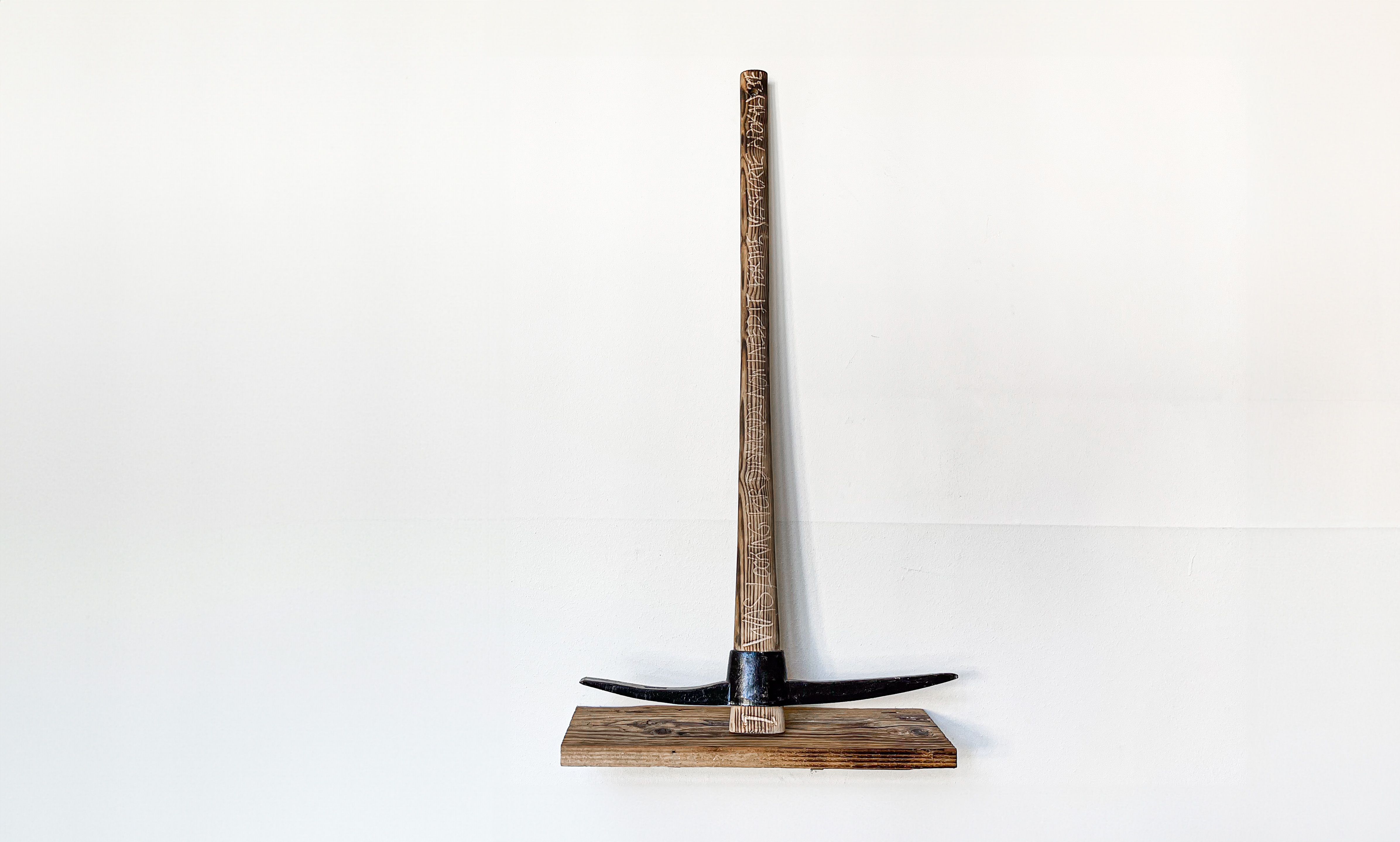 engraved pick axe