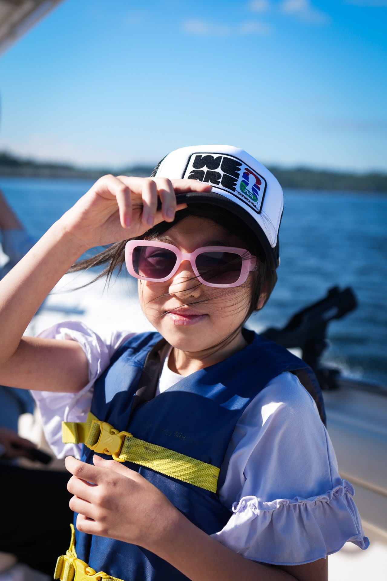 Ariel, unimpressed by the speed and spray — the coolest sailor on the boat
