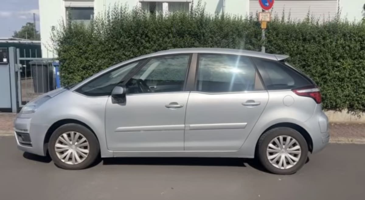 silver minivan-esque car