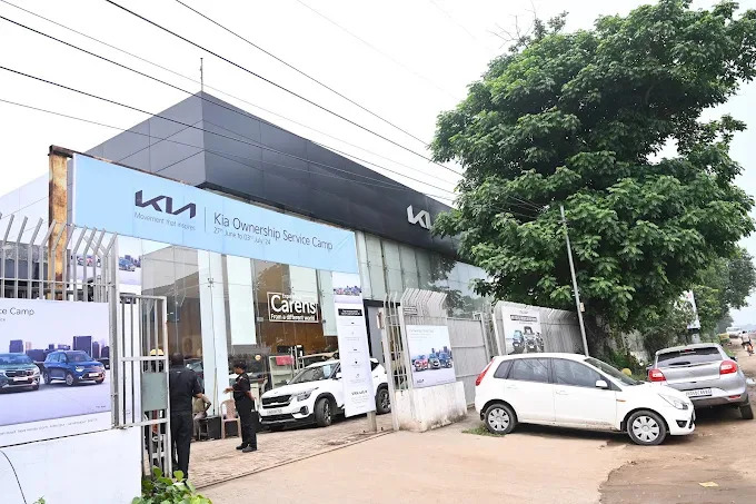 Exterior architectural facade of authorized Kia dealership