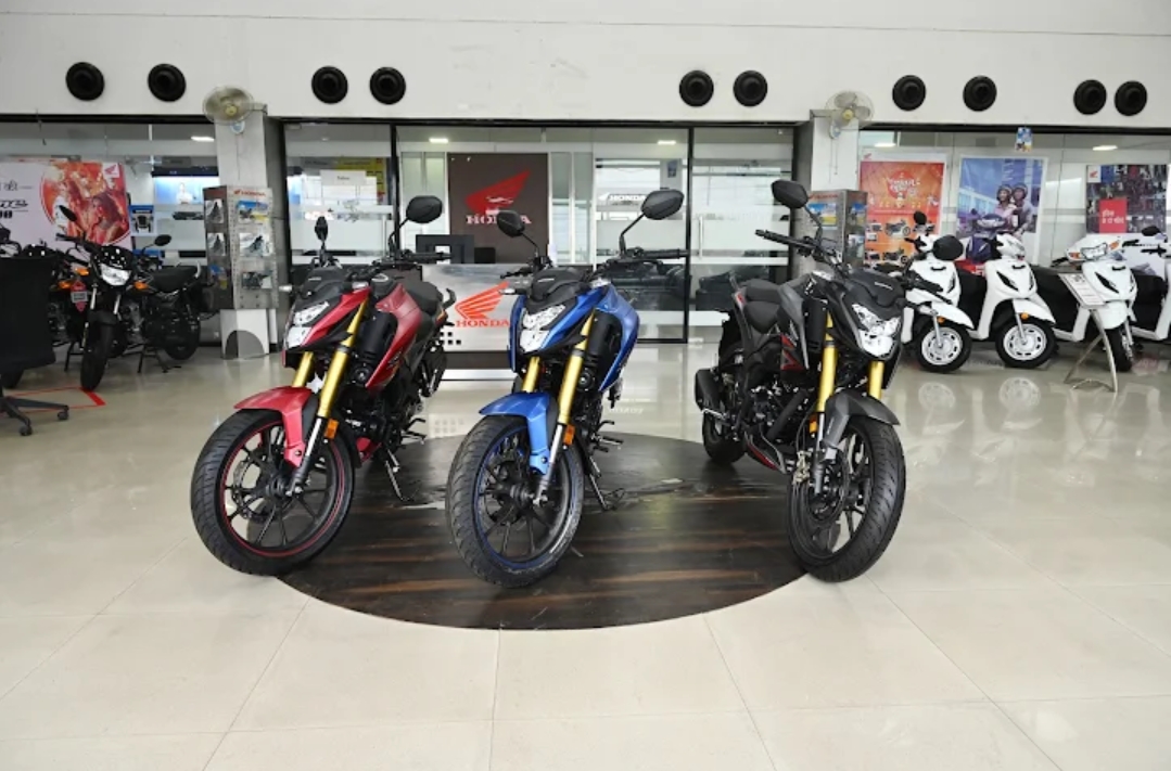 Honda two-wheeler showroom with scooters and motorcycles on display