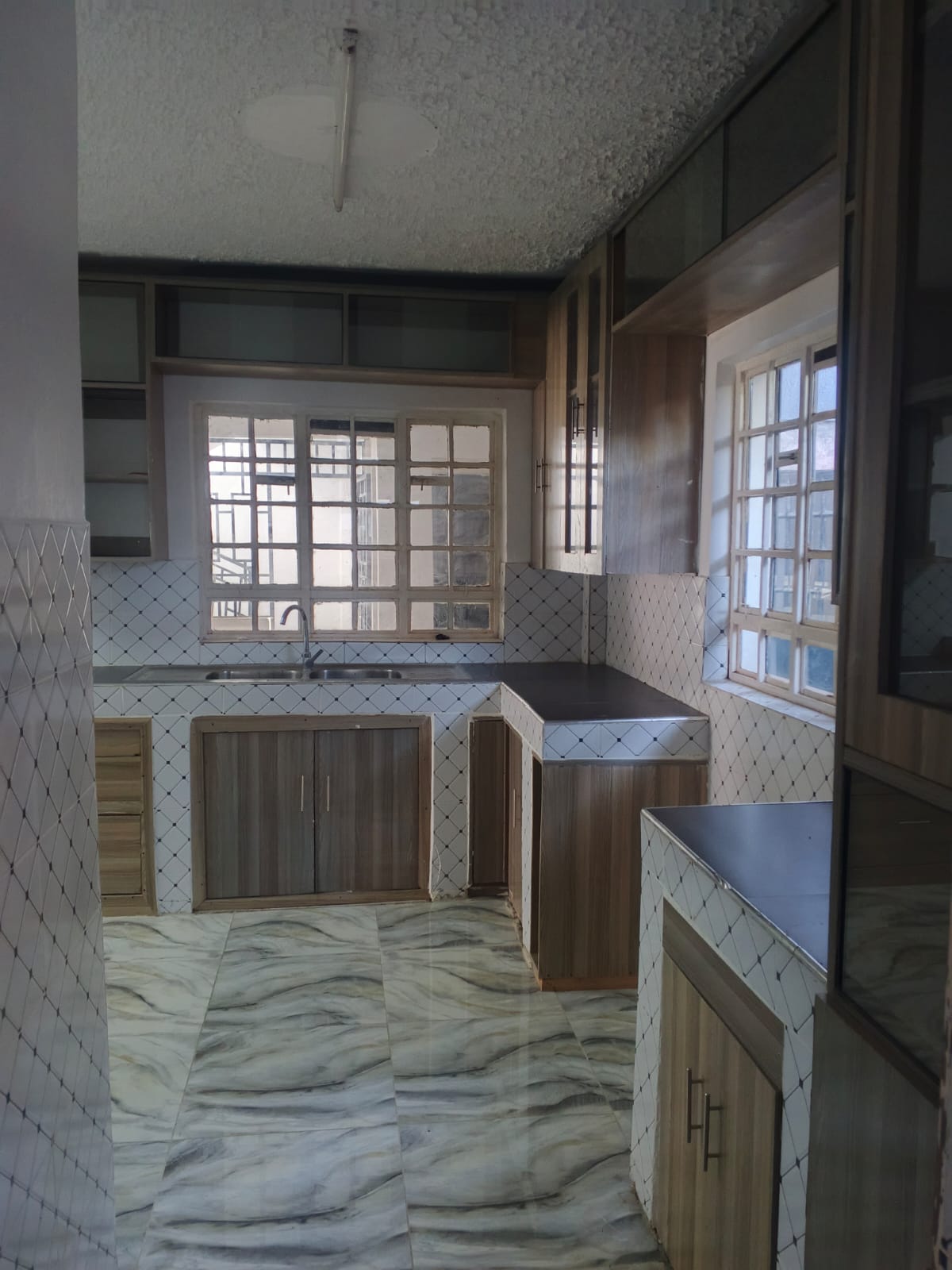 Master bedroom of 4 Bedroom Ground Floor Duplex + SQ to Let in Safaricom 2 Estate, Kitengela – Secure & Serene