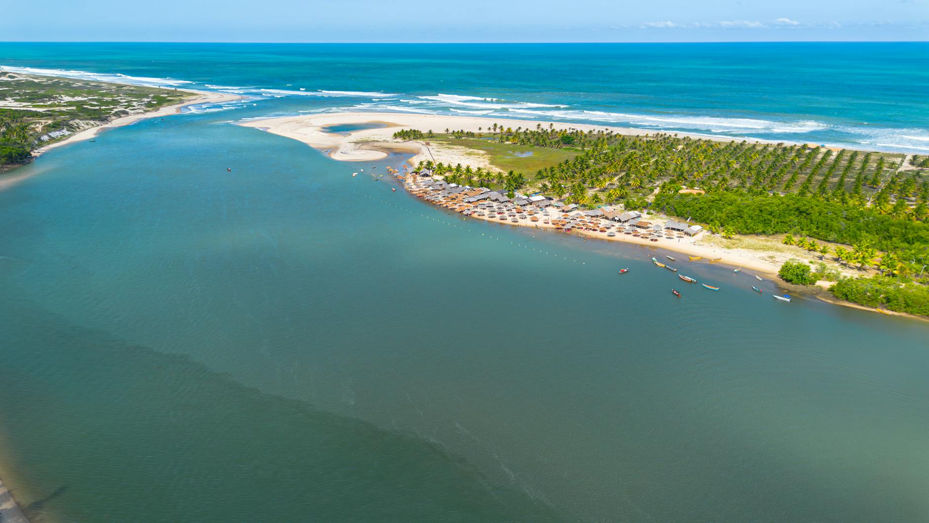 Stunning aerial view of a tropical beach and coastline in Jandaíra, Brazil.