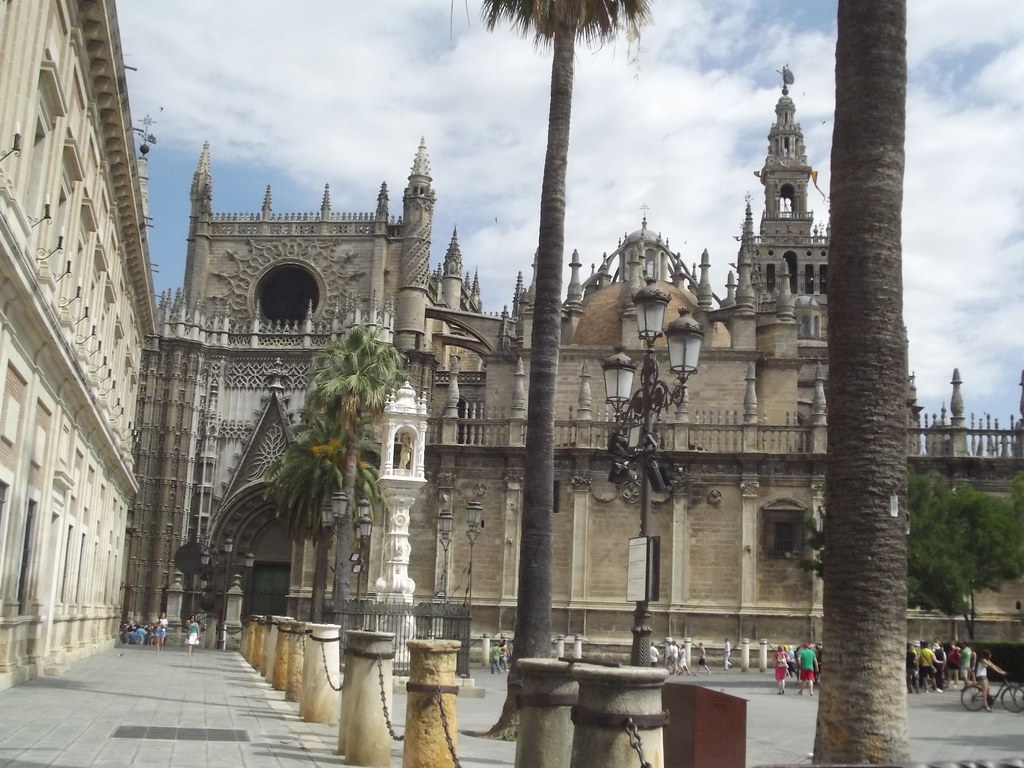 Seville Cathedral and rear of The Archivo General de Indias - Plaza del Triunfo - Seville - The Triumph (El Triunfo)