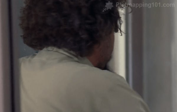 Burt walks out of the front desk area.