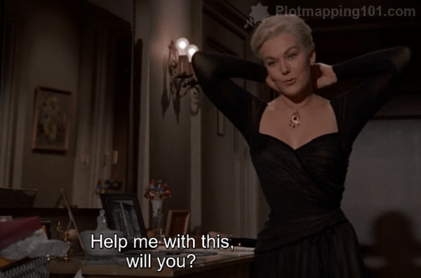 "Help me with this, will you?" Judy asks, holding the necklace closed behind her neck.