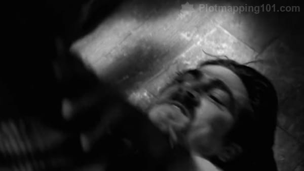 Jimmy's head on the ground while Leonard fights to strangle him.