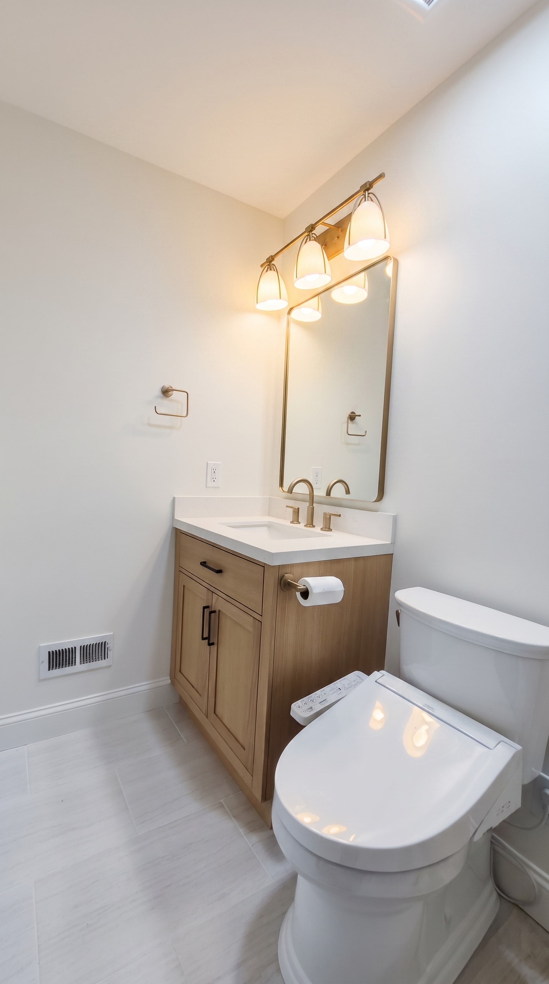 Powder room remodel with brass bidet fixtures, AZ Home Remodeling