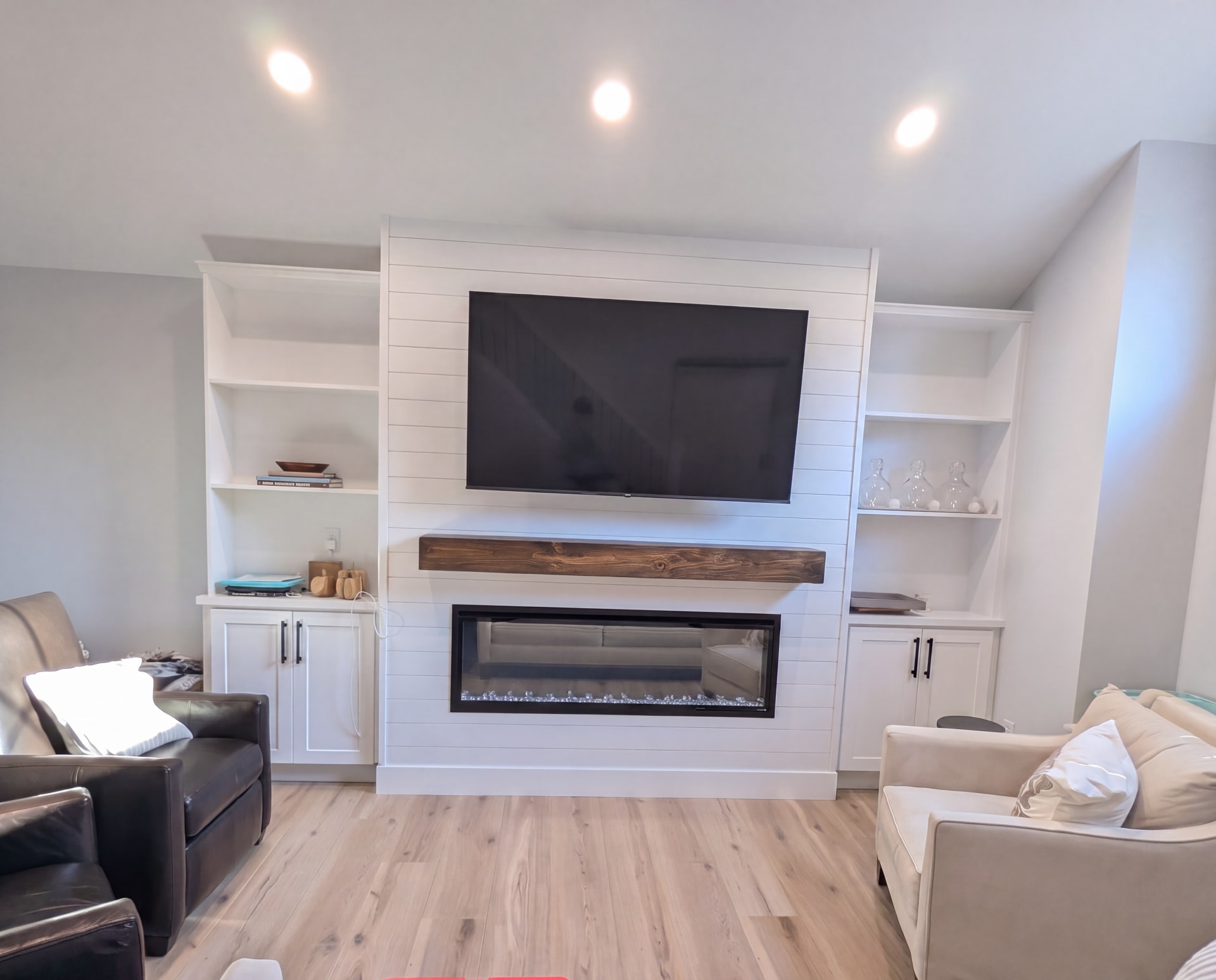 Finished basement media wall with shiplap fireplace surround, AZ Home Remodeling