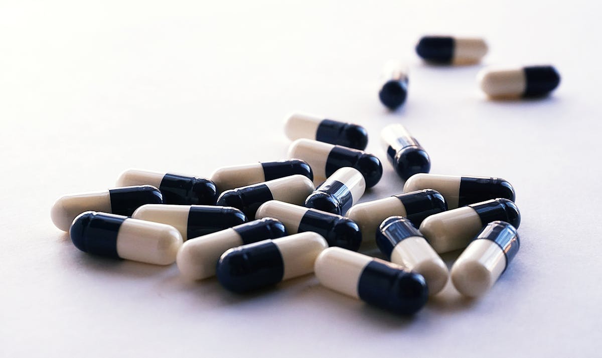White and black antibiotic capsules