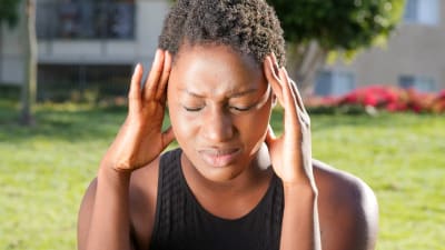 Woman with headache — Panadol Extra
